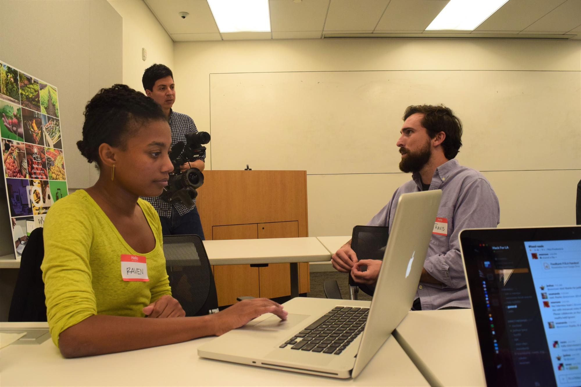 Food Oasis LA team members talking with CNN Tech